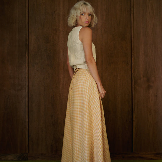 Three-quarter back view of the Rosemary Skirt in CandyCorn gingham, showing the full-length silhouette.