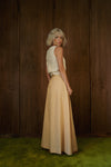 Three-quarter back view of the Rosemary Skirt in CandyCorn gingham, showing the full-length silhouette.