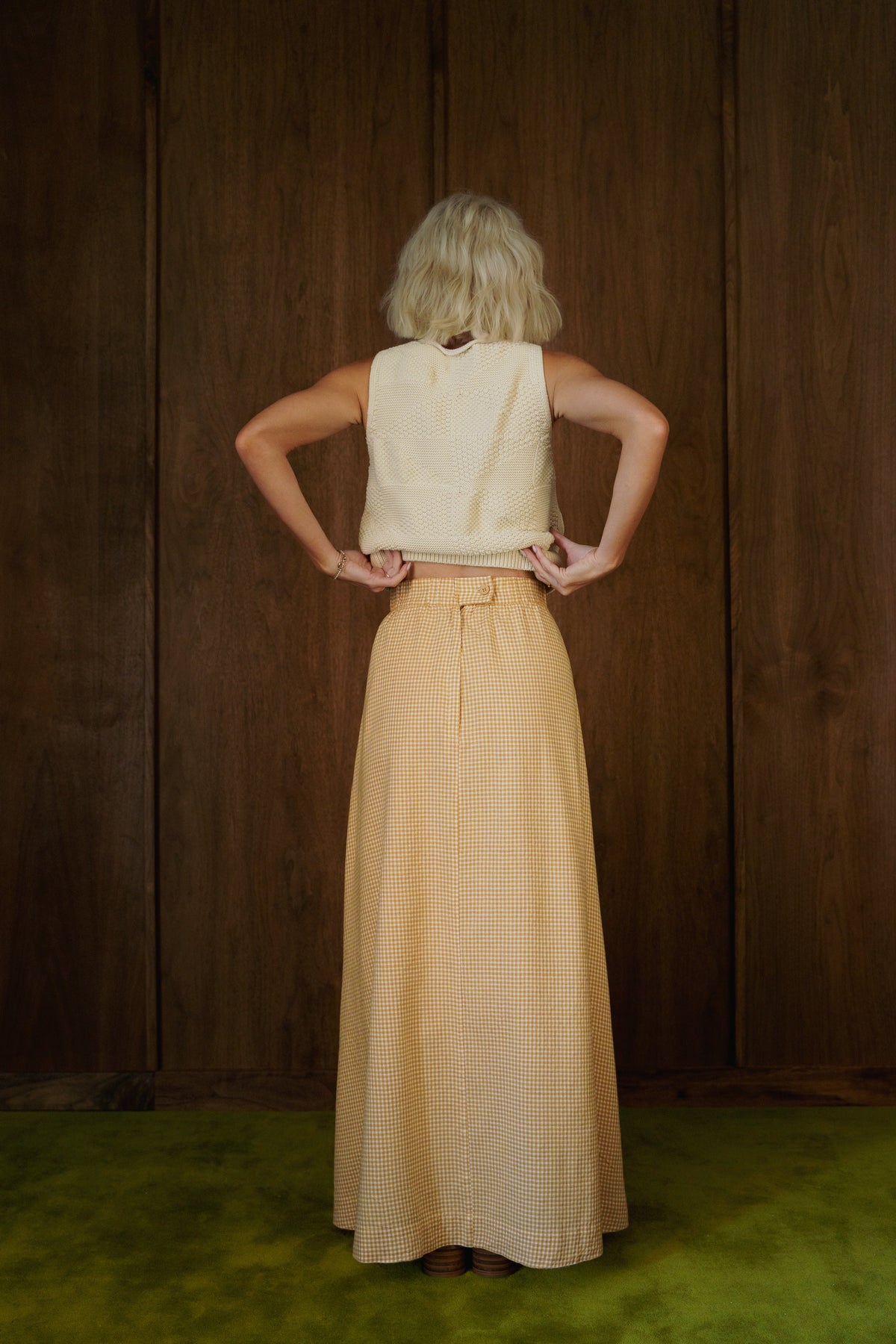 Back view of the Rosemary Skirt in CandyCorn gingham, showing the waistband and sweeping skirt.