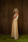 Side profile of the full-length Rosemary Skirt in CandyCorn gingham.